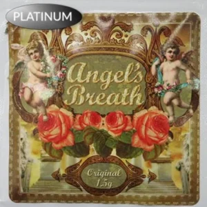 Angels Breath Herbal Incense package emitting gentle, aromatic smoke in a peaceful setting, creating a serene atmosphere for relaxation and mindfulness